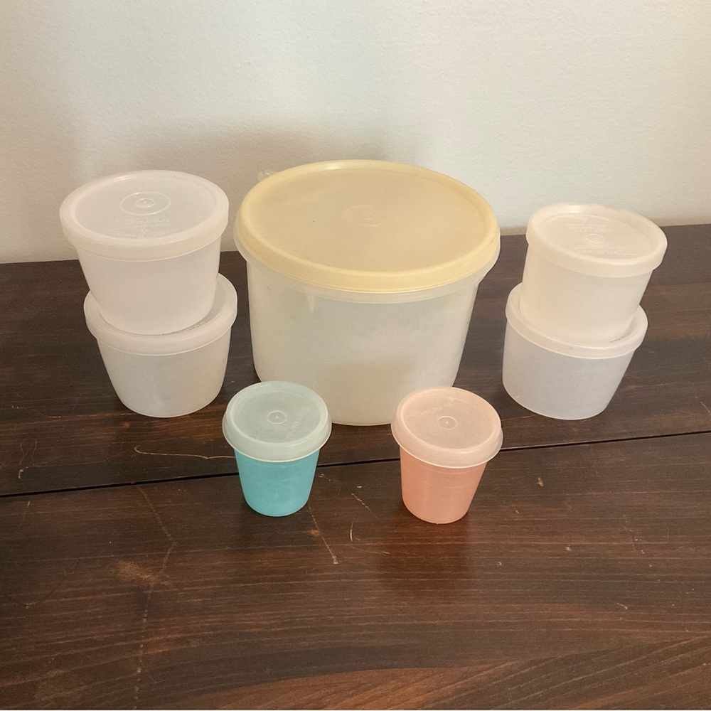 Tupperware Set with Cream, Blue, and Pink Lids